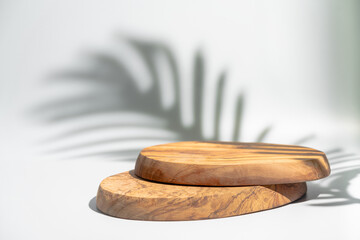 Wooden podium with leaves shadows. Realistic wood platform for product presentation. Minimal nature...