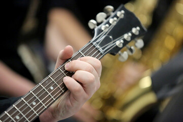 Guitarist Fingers the Frets