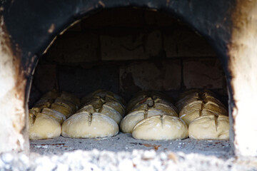 Rural oven in a Ukrainian village with dough ready for baking