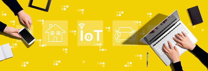 IoT theme with two people working together