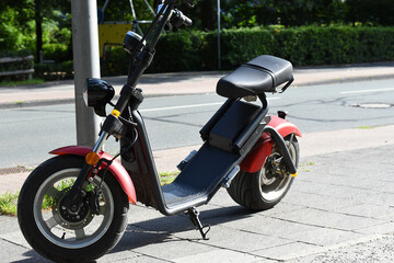 e scooter with big tyres on the street