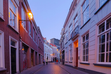 Cityscape small northern european city. Stone street with old houses and buildings. Breda, Netherlands