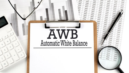 Paper with AWB - Automatic White Balance a table on charts, business concept