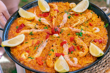 Traditional seafood paella at a restaurant in Valencia, Spain. Typical spanish food.