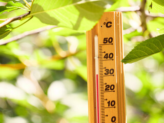 Red heat warning , Heatwave cause climate change and global warming . Weather Thermometer making 30...