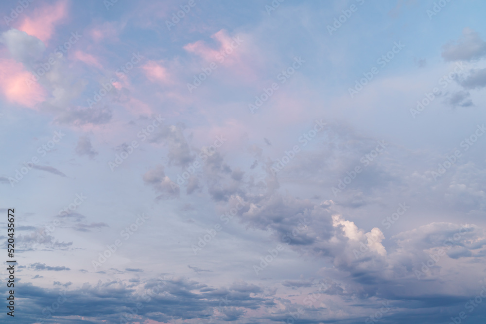 Wall mural beautiful high resolution sunset sky replacement background with a layer of low lying cumulus clouds