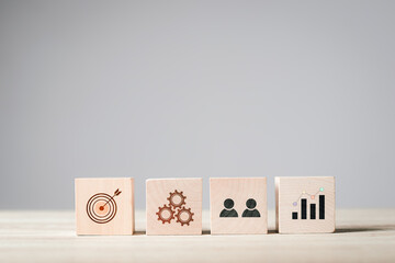 Concept of business strategy and action plan. wood cube block, goal and target, teamwork business development management concept