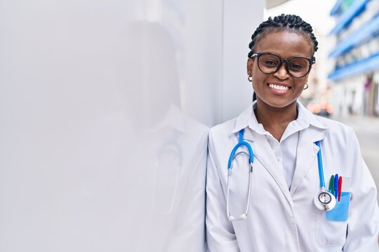 African american woman doctor smiling confident standing at hospital