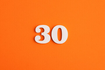 Number 30 - On orange foam rubber background