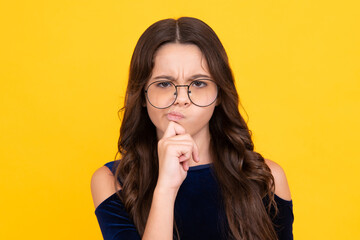 Thinking pensive clever teenager girl. Beautiful teenager child 12, 13, 14 years old over isolated...