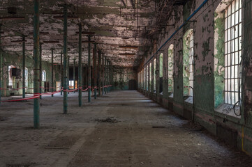 An abandoned old factory made of red bricks - a spinning mill in Poland