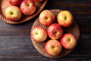 Red apple fruit on wooden background, Table top view, Healthy fruit