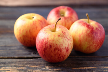 Red apple fruit on wooden background, Healthy fruit