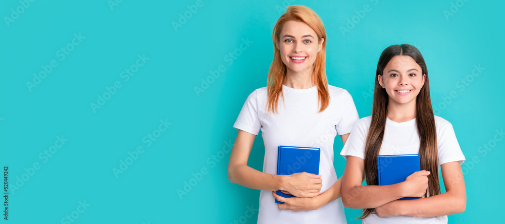 Wall mural mother and daughter child banner, copy space, isolated background. childhood education. happy pupil 