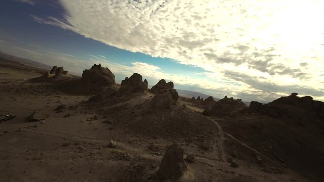 Fast flight over rugged desert landscape made famous in Hollywood science fiction movies - Trona Pinnacles aerial flyover in FPV drone
