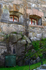 Windows and stone wall detail on historic building in the Oscarsborg Fortress, historic WW2 site in Norway

