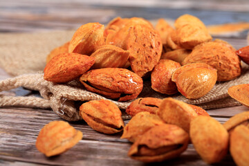 Badam, almonds is on the wooden table