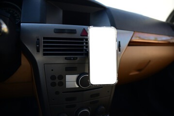 Holder with modern mobile phone in car. Mockup for design