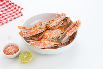 Steamed Blue Crab served on plate, food preparation