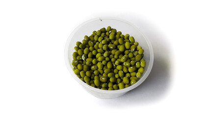 a cup of mung beans on a plain white background. Food and drink ingredients