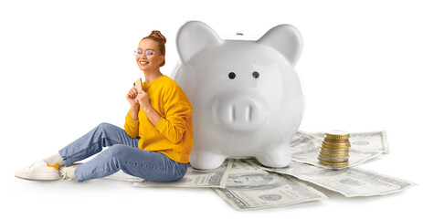 Beautiful young woman with smartphone, money and big piggy bank on white background