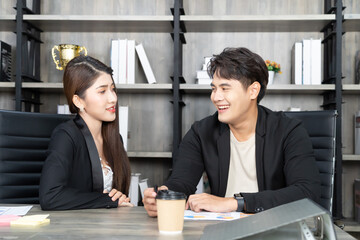 Happy group of businesspeople during presentation. Business people working as a team at the office