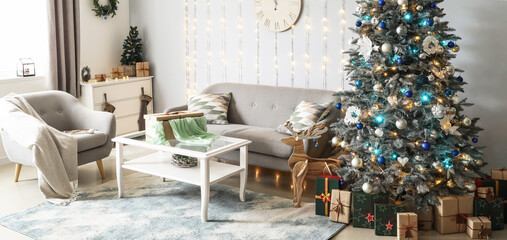 Light interior of living room with Christmas tree and gifts