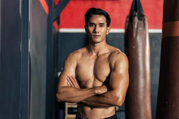 Fototapeta na wymiar Portrait of Asian Bodybuilder workout exercise for healthcare at gym. 