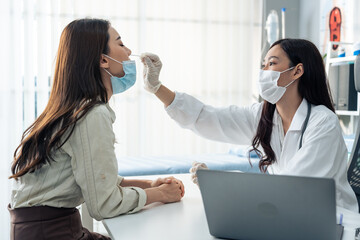 Asian professional specialist doctor diagnosis PCR Coronavirus sample. 