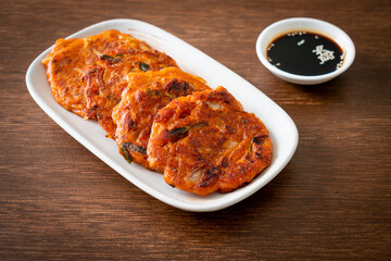 Korean Kimchi pancake or Kimchijeon - Fried Mixed Egg, Kimchi, and Flour