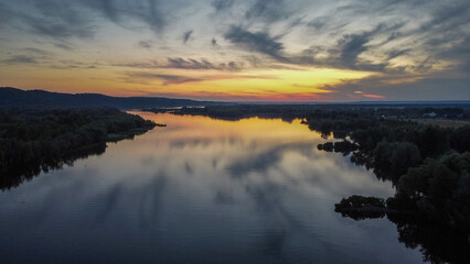 the Dnieper river flows among the forests and fields, ukraine filming from a drone. view from above
