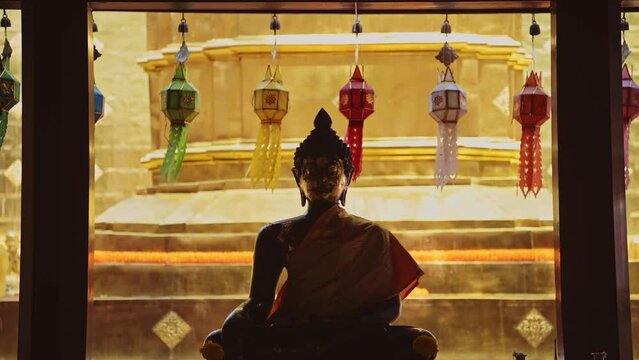 Gold Buddha Statue, Thailand Buddhist Temple at Chiang Mai, Wat Phra Singh, Silhouette with Colourful Prayer Lanterns at a Beautiful Famous Building and Popular Tourist Attraction