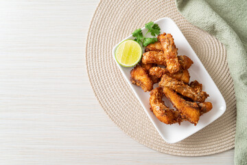 Fried Snapper Belly on white plate