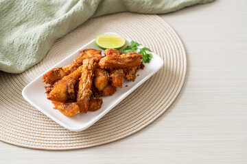 Fried Snapper Belly on white plate