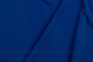Fleece fabric blue top view. Texture of textile fleece bedspread.	