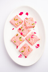 Rose Kalakand pink barfi or burfi also known as flavoured Mishri Mava Or Khoa Milkcake mithai