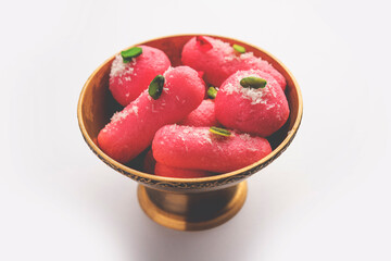 Pink Chumchum or rose flavoured chum chum or cham cham, indian and pakistani sweet