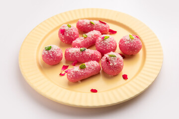 Pink Chumchum or rose flavoured chum chum or cham cham, indian and pakistani sweet