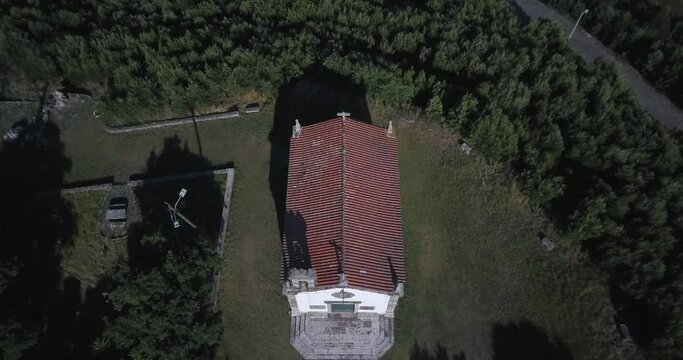 zoom out of small church in afife with some green trees in background, Viana do Castelo in a sunny day
