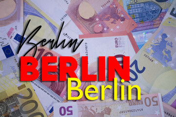 Berlin word with money. Paper currency background with different banknotes.