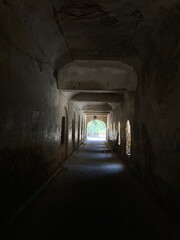 Fototapeta na wymiar View through a tunnel on at road 