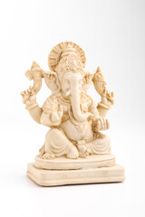 antique lord ganesha sculpture on white background.