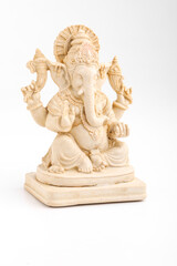 antique lord ganesha sculpture on white background.