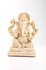 antique lord ganesha sculpture on white background.