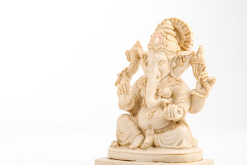 Obraz premium antique lord ganesha sculpture on white background.