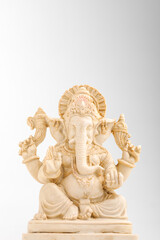Fototapeta na wymiar antique lord ganesha sculpture on white background.