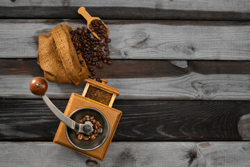 Vintage coffee grinder.Old retro hand-operated wooden and metal coffee grinder.Manual coffee...