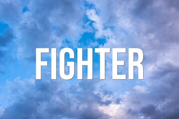 Fototapeta premium FIGHTER - word on the background of the sky with clouds.