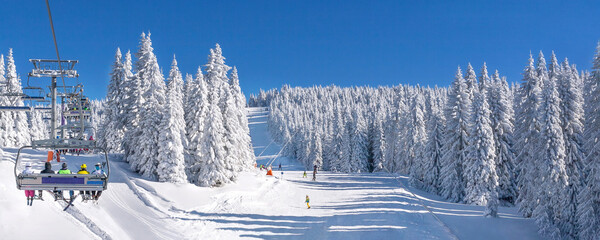 Panorama of ski resort, slope, ski lift