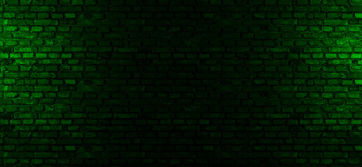 Fototapeta na wymiar Dark brick wall, green light, background image